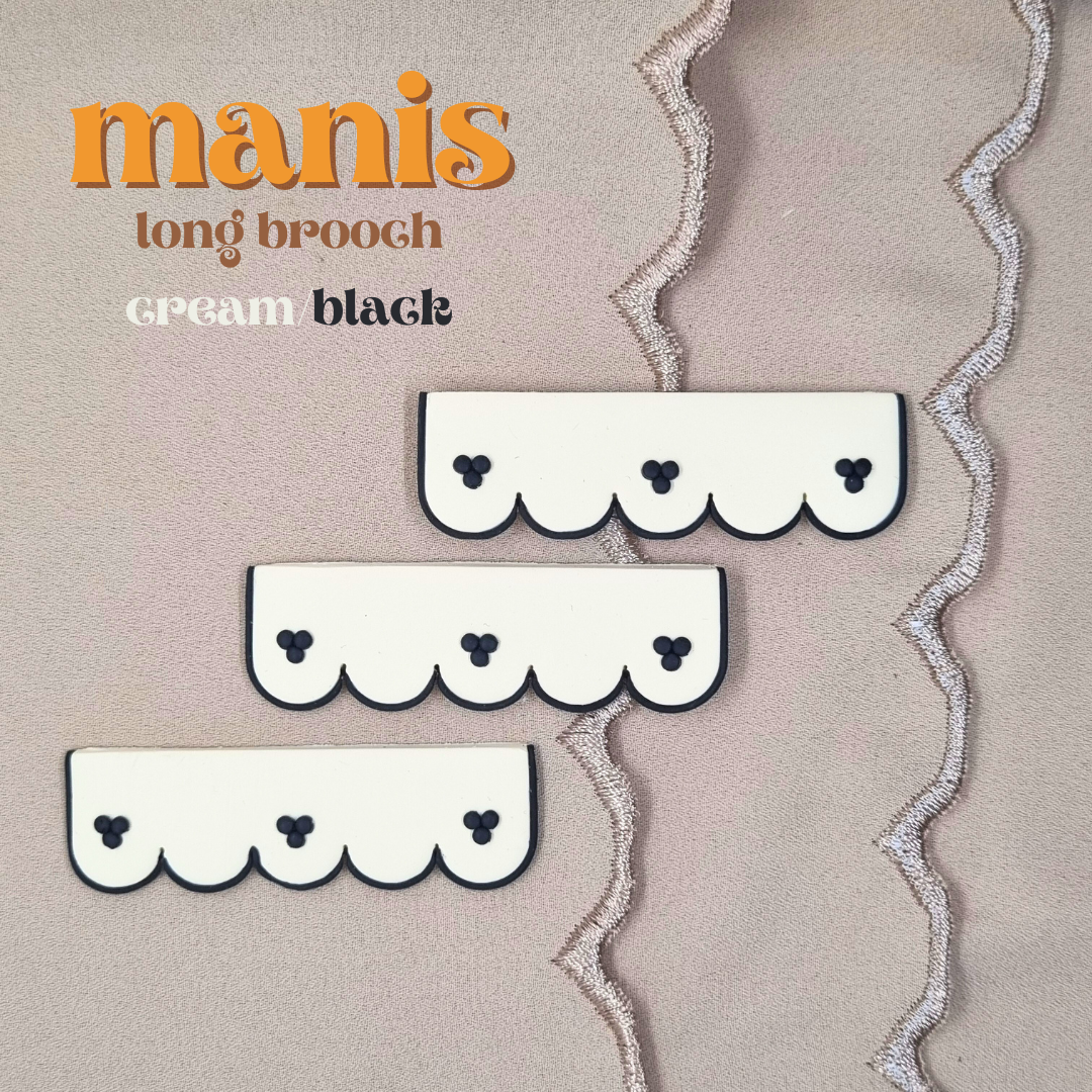 Manis: Long Brooch